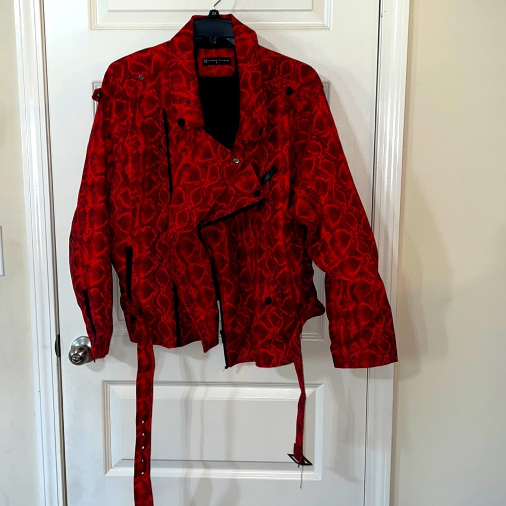 Gently used Moro jacket from F2F. Red python print. Matching leggings not incl.